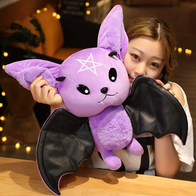 Black bat plush toy with grey ears and belly, pink nose, white fangs, and a yellow crescent moon. - Image 5