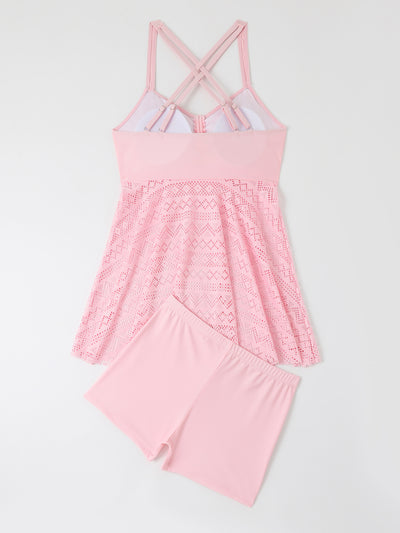 Plus size red two-piece swimsuit with a sling top and a laser-cut swim skirt, worn with a straw hat. - Image 33
