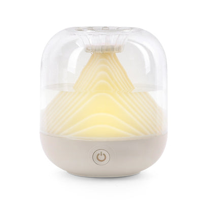 Red USB rechargeable humidifier with a clear dome top and a unique mountain-shaped interior design. - Image 14