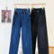 Artisanal Vintage Jeans with Embroidery and Warm Wash