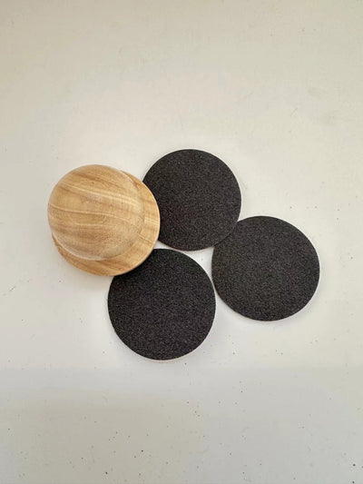 Red wooden dog claw grinding tool with a spherical handle and three circular black abrasive sanding pads. - Image 10