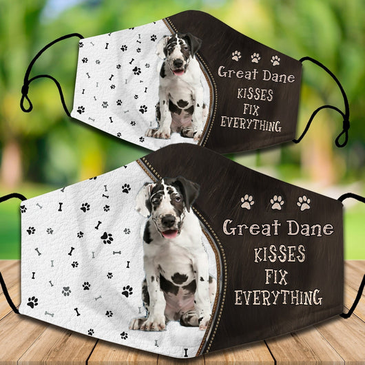 Two cotton face masks with a Bichon Frise dog, paw prints, and bones on a white and brown background. Text reads "Bichon Frise KISSES FIX EVERYTHING." - Image 39