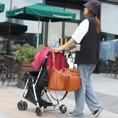 Bolso Maternal de Cuero PU con Gran Capacidad para Mamá y Bebé - Image 9