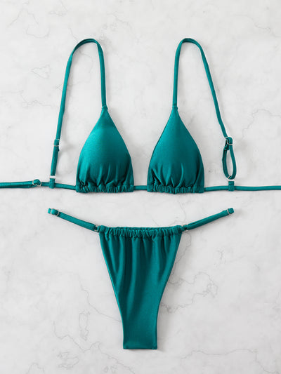 Brown bikini set with triangle top and thong bottom, featuring adjustable straps, displayed on a marble surface. - Image 12