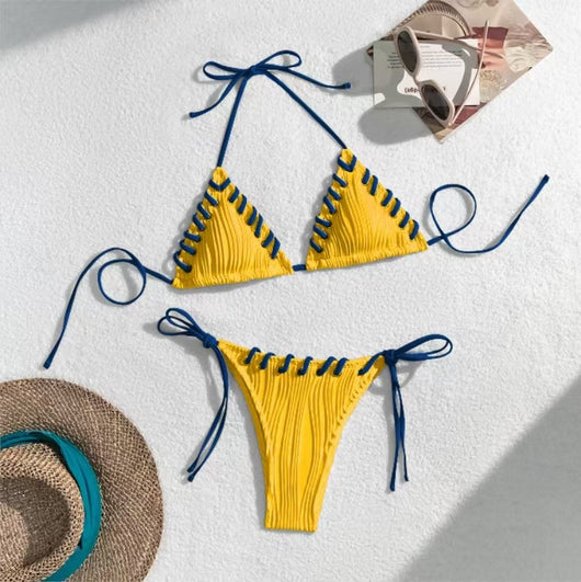 Light blue ribbed bikini swimsuit with pink tie straps and lacing detail, featuring a triangle top and thong bottom. - Image 3