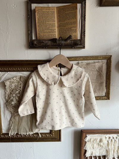 Blusa Infantil a Cuadros con Detalle Floral para Niña - Image 9