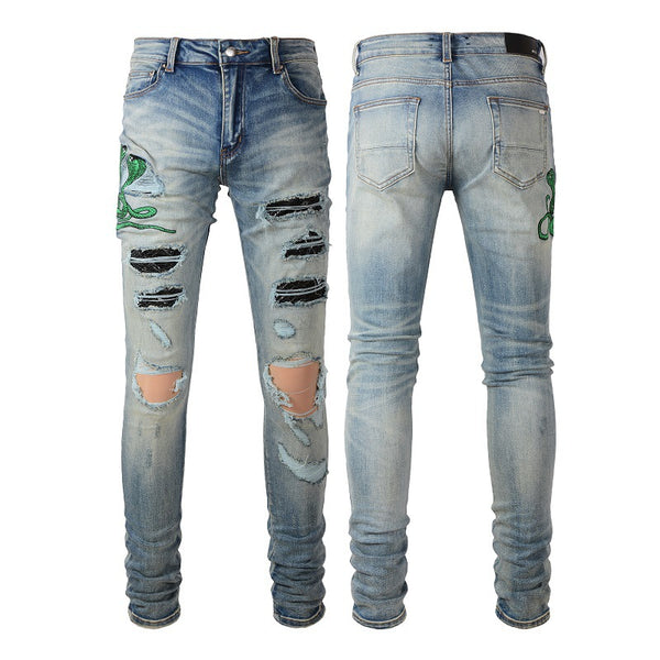 Jeans Slim Fit Azul con Pliegues, Detalles de Piel de Serpiente y Rotos Bordados