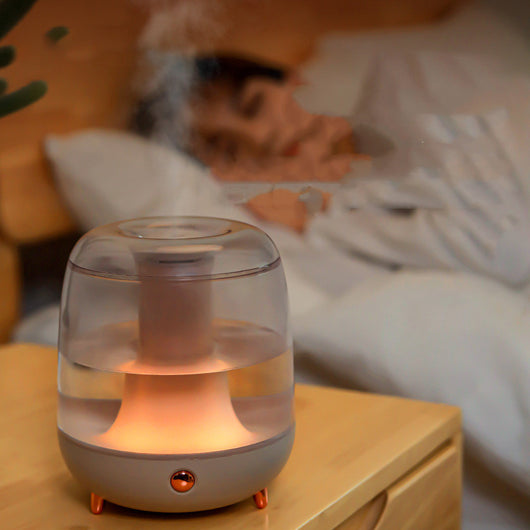 Fashionable dark green and clear portable smart water replenisher with rose gold accents on a white background. - Image 2