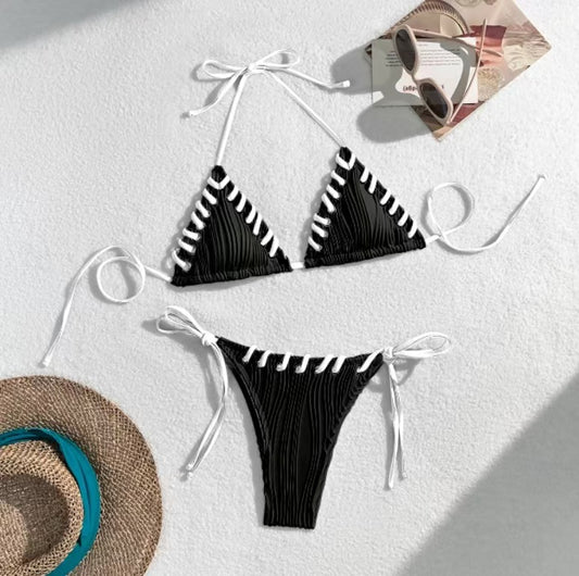 Light blue ribbed bikini swimsuit with pink tie straps and lacing detail, featuring a triangle top and thong bottom. - Image 2