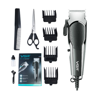 VGR V-130 professional hair clipper set with silver and black clipper, four guide combs, scissors, comb, and oil. - Image 4