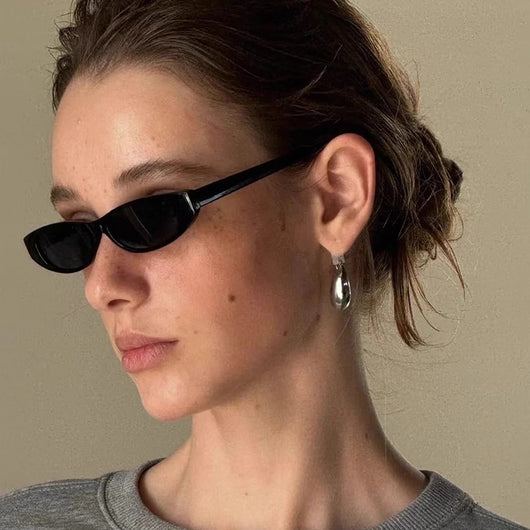 Yellow retro small frame sunglasses with translucent frames and matching yellow lenses on a white background. - Image 2