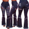Jeans Acampanados Rotos con Bordes Crudos