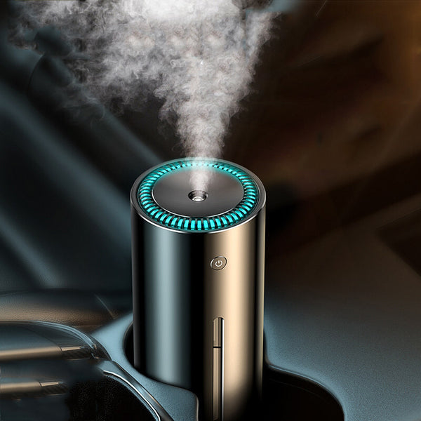 Dark gray cylindrical vehicle-mounted humidifier with a power button, mist outlet, and water level indicator.