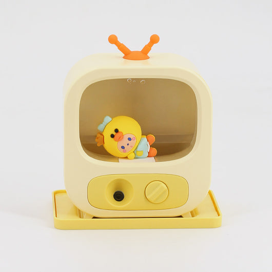 Pink TV-shaped desktop humidifier with a cute pink caterpillar figure inside, featuring a mist outlet and control knob. - Image 16