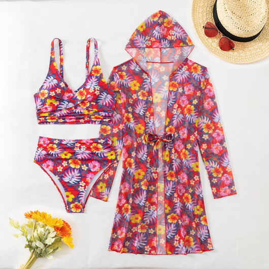 Woman in a red multicolor floral print three-piece swimsuit with high-waisted bikini and long-sleeve cover-up, straw hat, and sunglasses on a beach. - Image 29