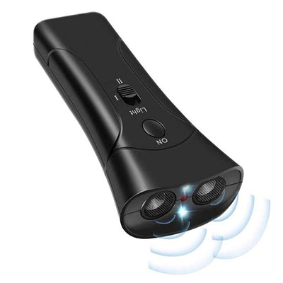 Black handheld ultrasonic dog repeller and trainer with a flashlight, featuring a slider switch and activation button.