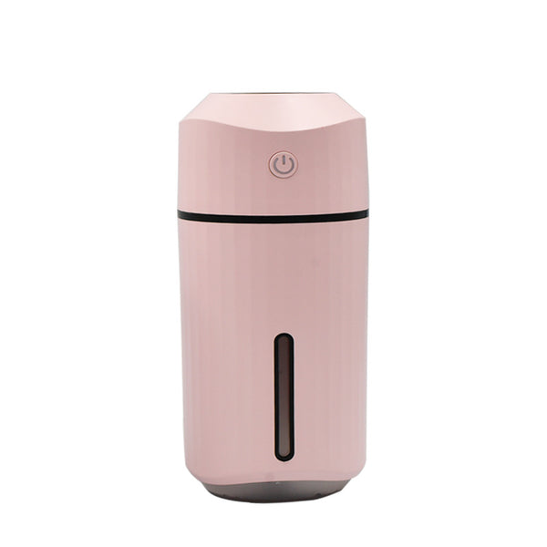 Pink columnar mini car humidifier with a power button and a clear water level indicator on a white background. - Image 7