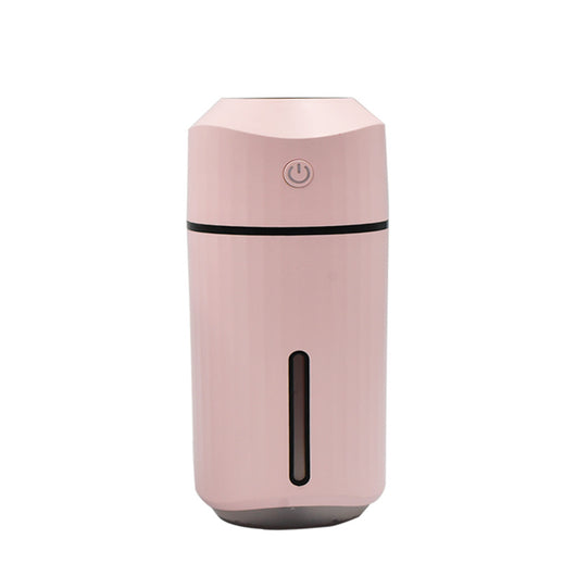 Pink columnar mini car humidifier with a power button and a clear water level indicator on a white background. - Image 7