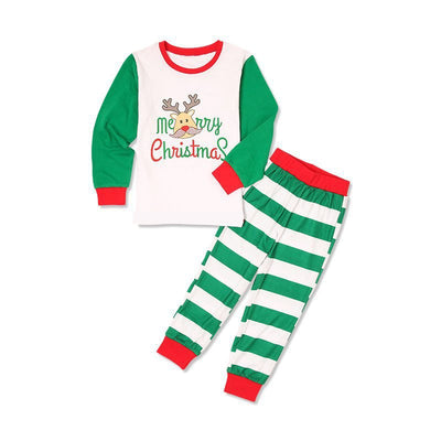 Family of four wearing matching white and green striped Christmas pajamas with reindeer and "Merry Christmas" text. - Image 2