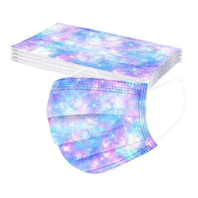 Stack of disposable children's face masks with a purple and blue tie-dye pattern and white ear loops. - Image 13