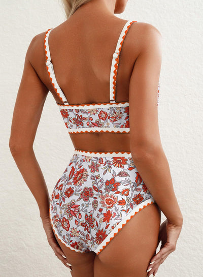 Green and white floral paisley high-waisted bikini swimsuit with scalloped edges on a model. - Image 26