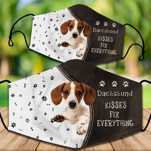 Two cotton face masks with a Bichon Frise dog, paw prints, and bones on a white and brown background. Text reads "Bichon Frise KISSES FIX EVERYTHING." - Image 36