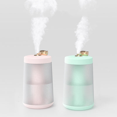 Cute cat-themed USB desktop humidifier with a pink top and base, frosted clear body, and gold cat ear accent. - Image 15