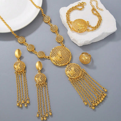 Gold butterfly jewelry set with filigree design, including a necklace, tassel earrings, bracelet, and ring. - Image 7