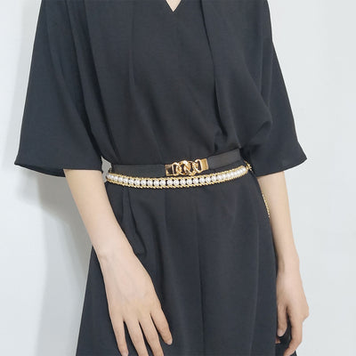 Black elastic belt for women with a gold-tone chain link buckle, perfect for dresses and shirts. - Image 2