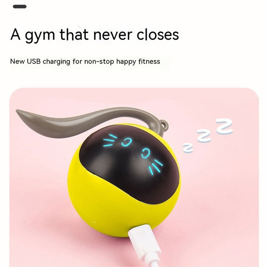 Yellow electric cat toy ball with a black face, glowing blue eyes and whiskers, and a grey tail attachment. - Image 4