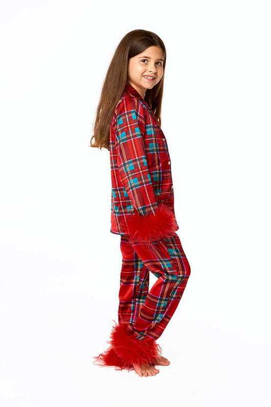 Young girl in a leopard print pajama set with black feather trim on the cuffs and ankles, wearing a pink glitter headband. - Image 14