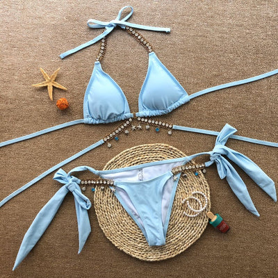 Turquoise triangle bikini with gold-toned rhinestone chain halter straps and matching charm-embellished waistline. - Image 11