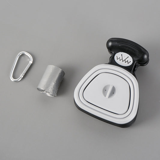 Blue and black foldable pet poop bag dispenser with an integrated scoop, ideal for travel and outdoor use.