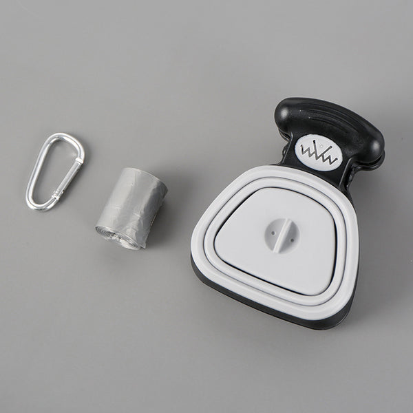 Blue and black foldable pet poop bag dispenser with an integrated scoop, ideal for travel and outdoor use.