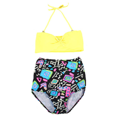 Women's two-piece swimsuit with a solid yellow bandeau top and black high-waisted bottoms with a vibrant abstract geometric pattern. - Image 7