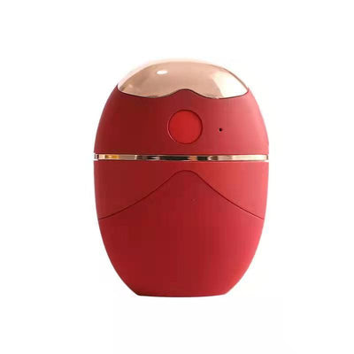White and rose gold eye protector mini spray and conditioner atomizing device with a smooth, ergonomic design. - Image 3