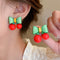 Aretes de Plata con Moño y Cerezas en Contraste de Colores