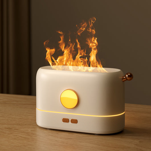 USB mosquito killer lamp with purple UV light and a white desktop humidifier with a simulated flame effect. - Image 6