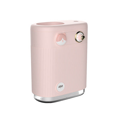 White cylindrical humidifier with ribbed texture, clear base, brown bear button, and silver dial, emitting mist on a white table. - Image 5