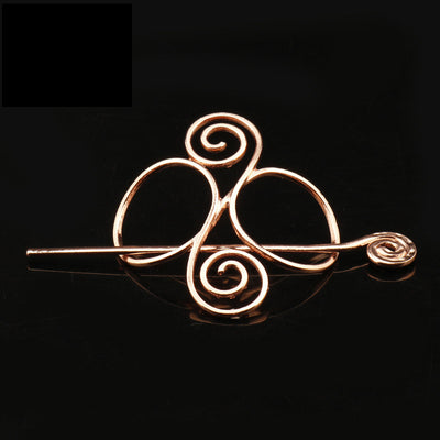 Silver metal hair clip with a retro dragon head and infinity knot design, secured by a plug-in hairpin. - Image 8