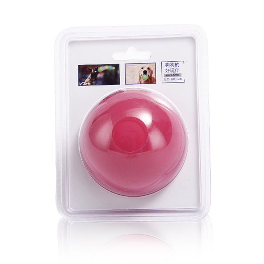 Red rubber elastic solid ball dog toy in clear blister packaging with images of dogs playing. - Image 6