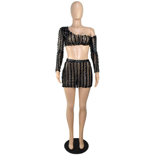 Black net hole hollow-out two-piece set with one-shoulder long-sleeve crop top and matching mini skirt. - Image 33