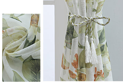 Dark gray semi-sheer curtains with a white and green floral pattern, hung on a black rod in a living room. - Image 25
