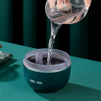 White essential oil diffuser and humidifier with a clear dome top, glowing red inside, and blue LED base light. - Image 7