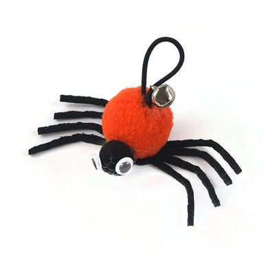 Orange and black plush spider cat toy with googly eyes and a silver bell on a white background. - Image 12