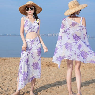 Women's light blue tropical leaf print three-piece swimsuit with short sleeve bikini top, bottoms, and sarong skirt. - Image 23