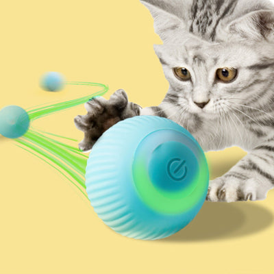 Pink USB rechargeable electric rolling ball cat toy with a textured surface and a power button, shown with its charging cable. - Image 4