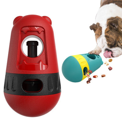 Red and black slow feeder dog toy with a treat dispenser, next to a bulldog playing with a green and yellow version. - Image 4