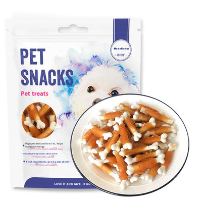 Pet Snacks chicken-wrapped milk bones in a white bag with a fluffy dog, alongside a bowl of treats. - Image 5