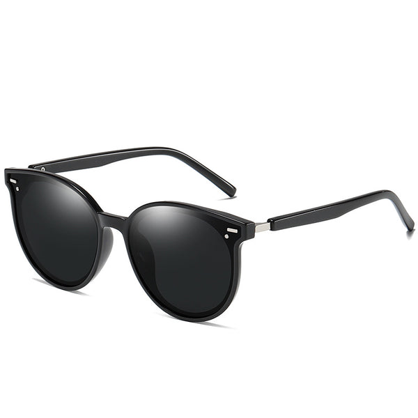 Transparent gray round frame polarized sunglasses with black-gray lenses on a white background. - Image 8